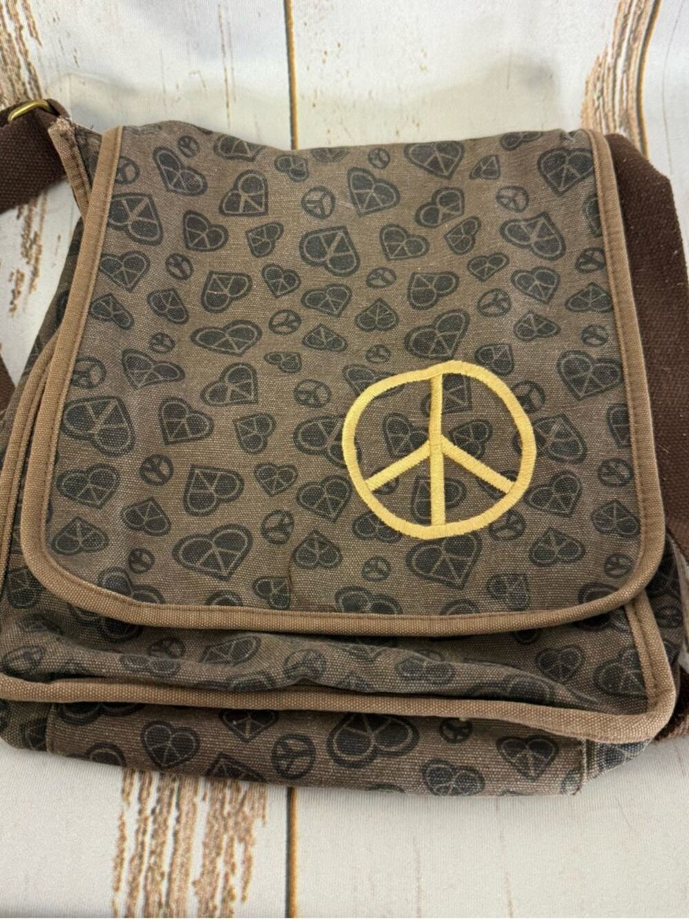 Brown Canvas Crossbody Bag with Yellow Peace Sign. Good used condition!